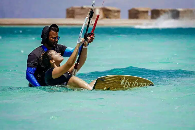 Learning to ride the kitesurfing board